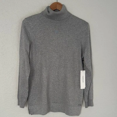 NUEVO Suéter Calvin Klein Gris Plata Brillante Tejido Cuello Alto Vacaciones de Navidad Foto 1 de 4