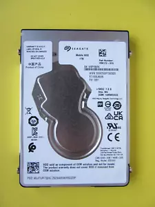 Seagate ST1000LM035 1RK172-570 7mm 1TB 2.5" HDD Drive March 2023 WU EB01 WKP - Picture 1 of 8