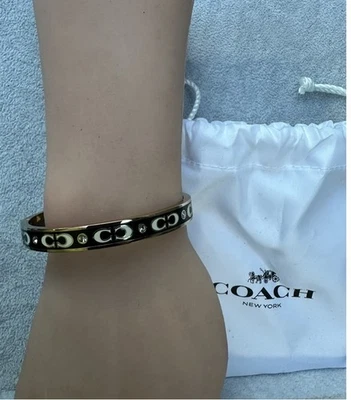 Brazalete con bisagras Coach Signature esmalte blanco y dorado - Nuevo con etiquetas bolsa antipolvo incluida Foto 1 de 2