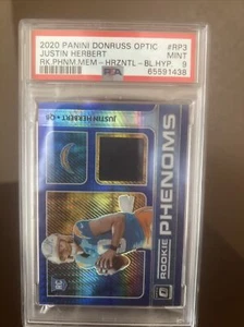 PANINI DONRUSS OPTIC ROOKIE PHENOMS MEMORABILIA JUSTIN HERBERT BLUE HYPER PSA 9 - Bild 1 von 4