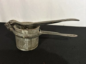 ANTIQUE CAST IRON RICER POTATO MASHER STRAINER HINGED HANDLE - Picture 1 of 7