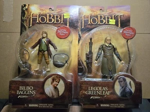 The Hobbit: An Unexpected Journey LOT OF 2 Legolas Greenleaf Bilbo Baggins Kmart - Picture 1 of 9