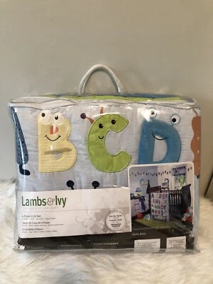 Juego de 4 piezas de edredón, sábana, apilador de pañales con volantes antipolvo Lambs & Ivy para cuna Foto 1 de 4