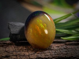 65.49 Carat Ethiopian Black Opal Cabochon 30x25x17 MM Oval Shape Welo Fire Opal - Picture 1 of 3