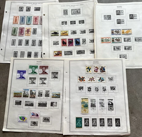 RWANDA STAMPS ON ALBUM PAGES FLOWERS, BUTTERFLIES, JFK, ABRAHAM LINCOLN & MORE Cover