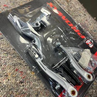 Promax V-freno, plata, palanca izquierda, con pastillas y accesorios Foto 1 de 3