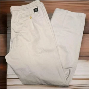 Pantalones chinos plisados Lacoste para hombre 36 X 32 caqui pierna recta. Piernas pequeñas manchas - Imagen 1 de 7