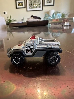 2014 Matchbox #MB65 MBX Heroic Rescue Road Raider Police Silver & Black - Image 1 of 4