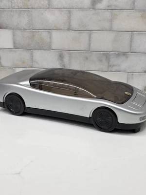 Rebobinadora de cinta de casete de video VHS vintage Kinyo plateada para auto deportivo Foto 1 de 4