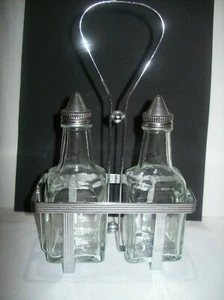 GLASS OIL AND VINEGAR CRUETS IN METAL CARRIER - Picture 1 of 2