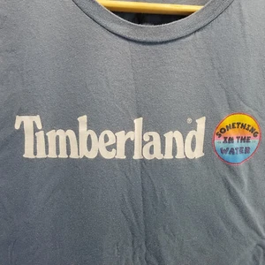 Timberland Shirt Womens Extra Large Blue NAture Needs Hero Short Sleeve Pullover - Picture 1 of 7