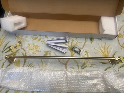 Barra de toallas Delta 73524-CZ Saylor 24", bronce champán Foto 1 de 4