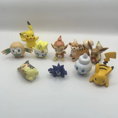 Pokemon Tomy Nintendo Lote de 10 Figuras Pikachu Morpeka Rowlet Chimchar Evee Foto 1 de 4
