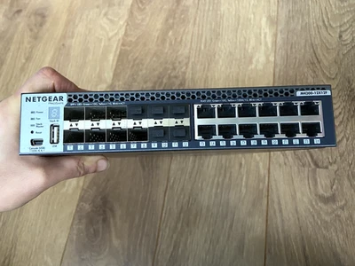 Netgear PROSAFE M4300-12X12F 12-Port 10G Copper & 10G Fiber L3 Managed Switch .. - Image 1 of 4