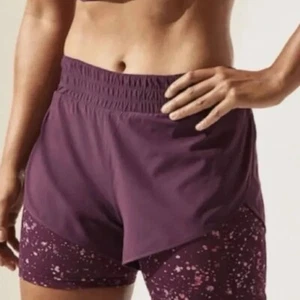 Athleta Hiit It 2 In 1 Printed Running Shorts In Warm Splatter Purple Size Small - Picture 1 of 6