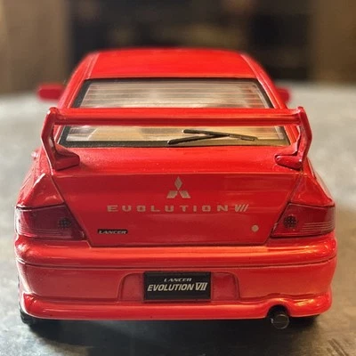 Modelo de coche Mitsubishi Lancer Evolution EVO VII escala 1:36 Kinsmart - rojo Foto 1 de 4