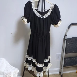 Elegantes schwarz-cremefarbenes Kleid - Bild 1 von 6