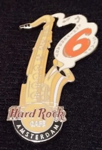 HARD ROCK CAFE AMSTERDAM 6TH ANNIVERSARY HERMAN BROOD SAX RARE 2005 STAFF PIN - Bild 1 von 2