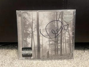 TAYLOR SWIFT SIGNED AUTOGRAPH FOLKLORE CD AUTOGRAPHED SEALED w/ HEART RARE - Picture 1 of 2
