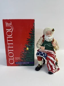 Clothtique Possibili Sogni 15214 Un Regalo ad una Nazione Babbo Natale Bandiera Patriottica - Foto 1 di 13