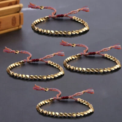 Pulsera cuerda de la suerte 4 piezas hecha a mano budista tibetana trenzada algodón cobre cuentas Foto 1 de 4