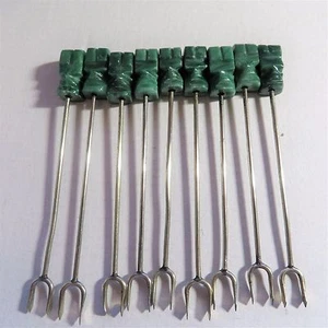 FABULOUS VINTAGE SET OF NINE CARVED JADE MASK HORS D' OEUVE PICKS - Picture 1 of 4