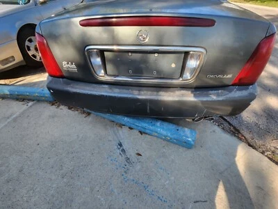 Parachoques trasero gris Cadillac Deville 2000 2001 2002 2003 2004 2005 Foto 1 de 4