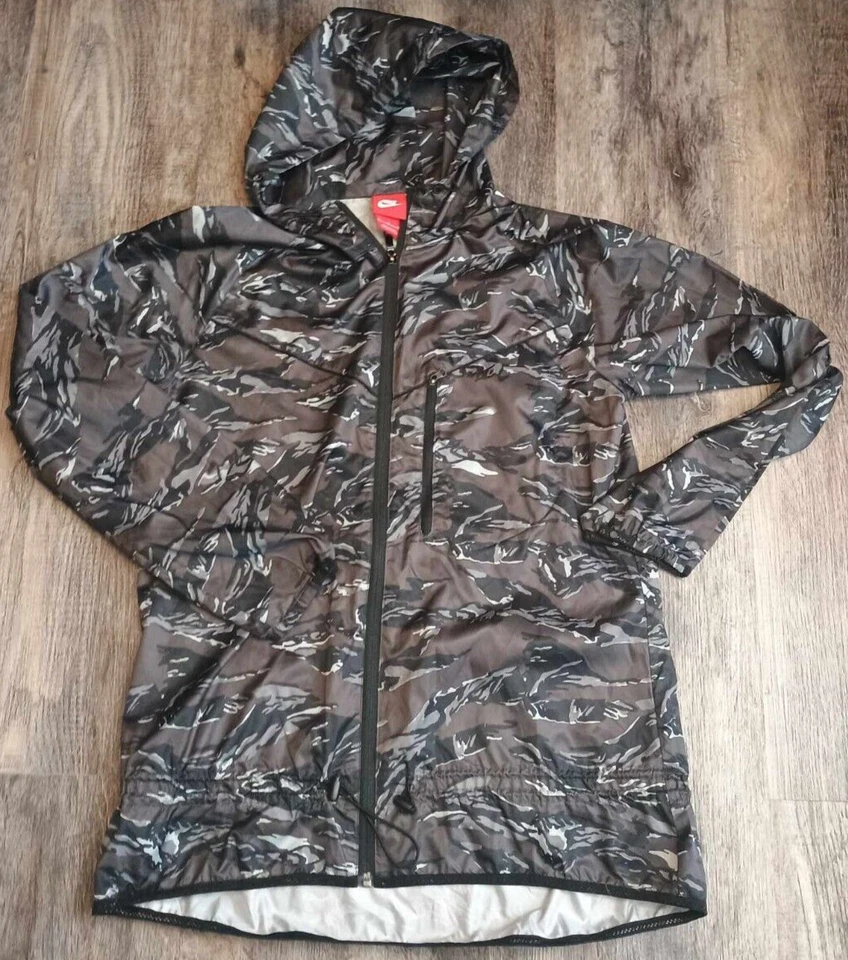 Nike Chaqueta Cortavientos Abrigo Mujer Gris Medio Urbano Camuflaje Cremallera Completa Con Capucha Foto 1 de 4