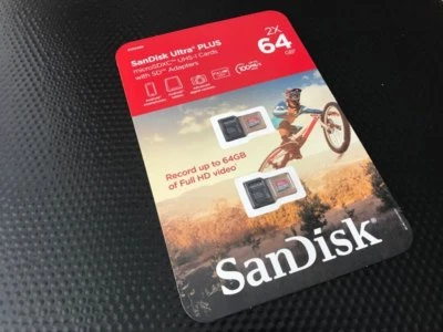 2X SANDISK 64GB ULTRA PLUS MICROSDXC UHS-I CARDS WITH SD ADAPTERS  - Image 1 of 2