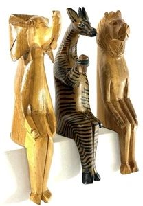 3er Set handgeschnitzte afrikanische Tierregal-Sitzer aus Holz - Elefant, Zebra, Löwe - Bild 1 von 7