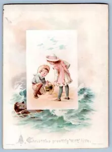 TARJETA DE ALEMANIA DE LOS NIÑOS DE NAVIDAD EN LA PLAYA DE LA COSTA DE 1890 HAGELBERG BERLIN - Imagen 1 de 2
