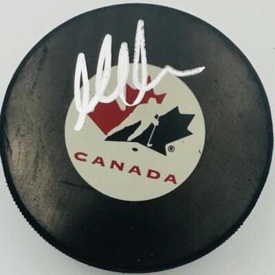 MARTIN BRODEUR SIGNED TEAM CANADA HOCKEY PUCK NEW JERSEY DEVILS BECKETT BAS J17 - Image 1 of 2
