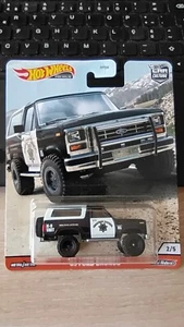 HOT WHEELS - '85 FORD BRONCO WILD TERRAIN PILOTI REALI 1/64 CIRCA *NUOVO* - Foto 1 di 4