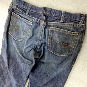 Pantalones de mezclilla Ariat FR para hombre 36x30 corte bota relajado M4 CAT 2 MANCHAS resistentes al fuego - Imagen 1 de 11