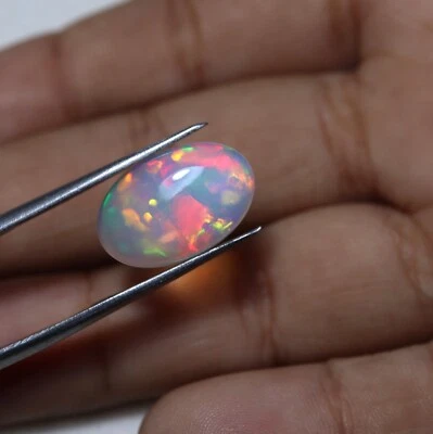 2.9 Cts 15.1x9.9 MM Real AAA Red Yellow Green Fire Ethiopian Opal Oval Cabochon - Image 1 of 4