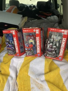Hasbro Transformers R.E.D. Serie 1 Megatron, Optimus Prime y Soundwave! - Imagen 1 de 9