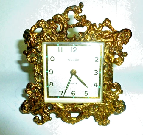 🎇VTG. GOLD GILT -WORKS HOLLYWOOD REGENCY GERMAN Wind Alarm Clock -Luminous Dial Cover