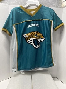 CAMISETA DE JACKSONVILLE JAGUARS NFL CON LOGO PLAY 60 EN LA ESPALDA. TALLA NIÑO JUVENIL MEDIANA - Imagen 1 de 5