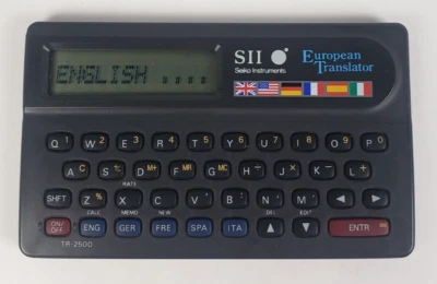 Seiko Instruments SII Spanish - English Translator Handheld Device - Image 1 of 4
