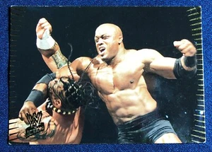 2007 TOPPS #73 WWE ACTION BOBBY LASHLY VS. UMAGA WRESTLING CARD - Picture 1 of 2