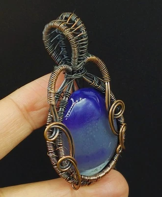 Colgante de piedras preciosas de ónix púrpura de joyería hecha a mano envuelto en alambre de cobre Foto 1 de 4