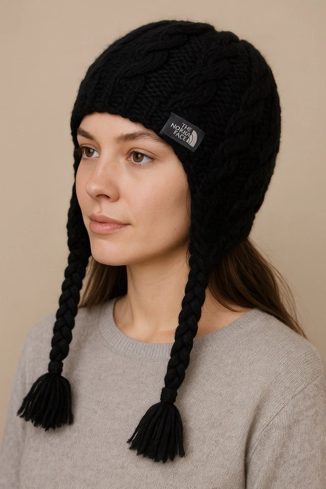 Sombrero trampero The North Face tejido con cable orejeras borla gorro negro mezcla de lana Foto 1 de 4