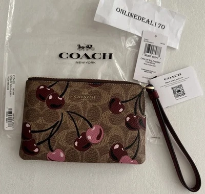 New Coach Corner Zip Wristlet - CZ450 Tan Signature Canvas w/ Cherry Print - NWT - Image 1 of 4