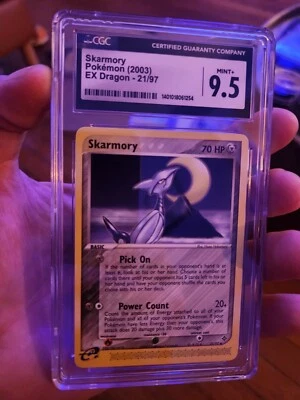 CGC 9.5 MINT + Skarmory 21/97 EX Dragon VINTAGE pokemon Card 2003 - Image 1 of 2