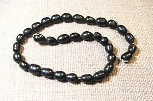 Beautiful Strand of 12mm x 10mm Oval Black Colored Freshwater Pearls Lot B5 - Picture 1 of 1