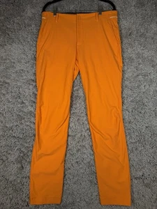 Nike Golf Modern Fit Dri-FIT Pants Mens Size 34x32 Orange Golfing 833186-856 - Picture 1 of 12