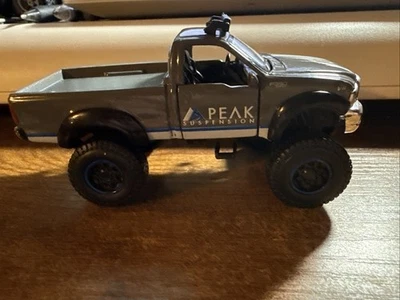 MAISTO FORD F-150 Gray 1:48 Peak Suspension Doors Open - Image 1 of 4