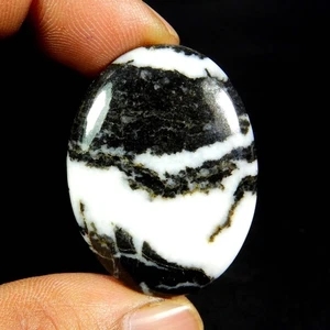 Pietra preziosa naturale forma ovale cabochon turchese bufalo nero bianco 43 ct #10932 - Foto 1 di 6