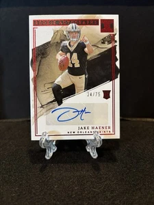 Jake Haener 2023 Panini Impeccable Rookie Autograph Red #25/75 Saints #RA-JH - Bild 1 von 2