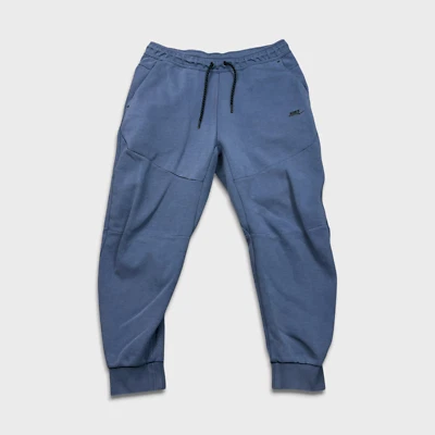 Pantalones deportivos Nike Sportswear para hombre grandes azules Swoosh Tech polar jogger atlético Foto 1 de 4